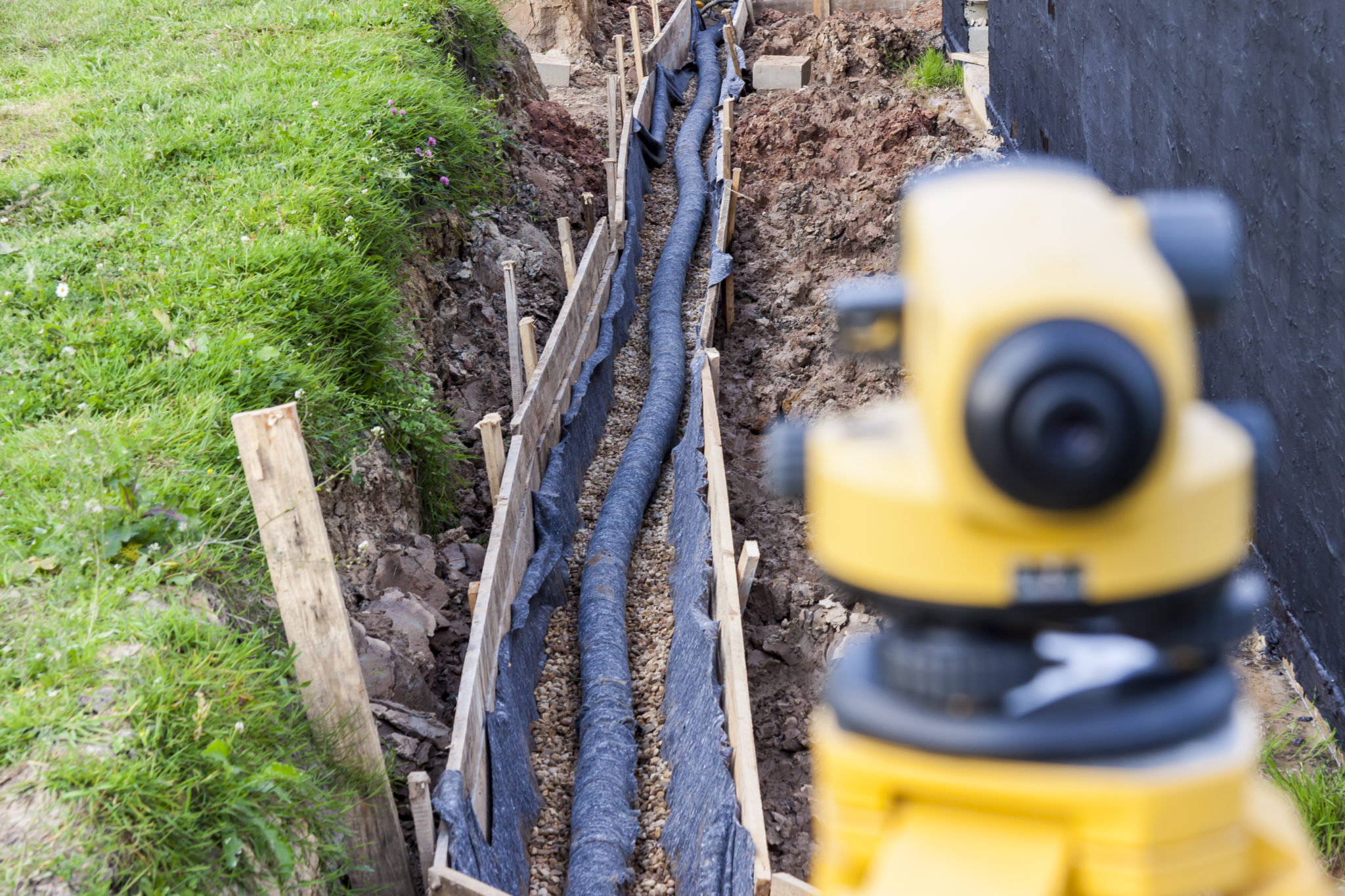 Foundation Drainage System and Grade Laser