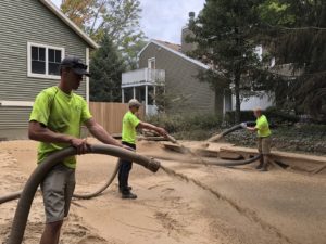 Sand slinging Sand slinging