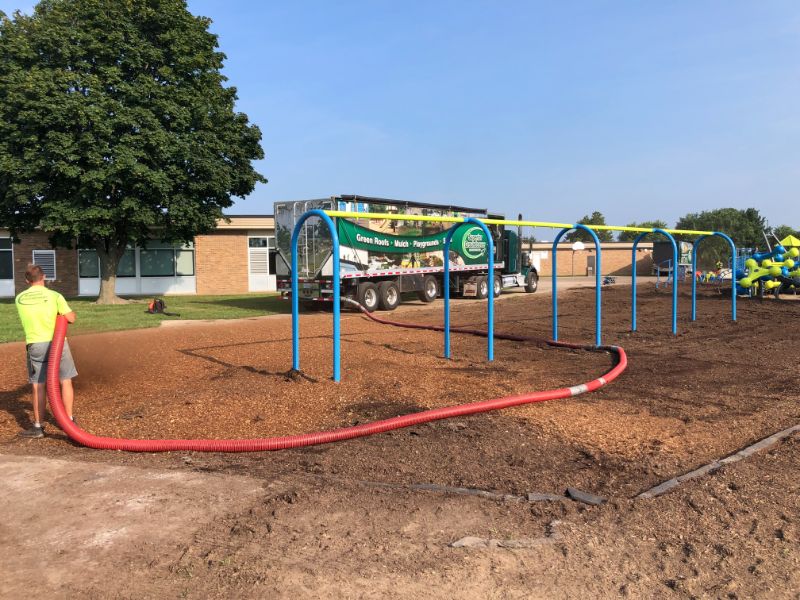 Our Team Installing Playground Mulch