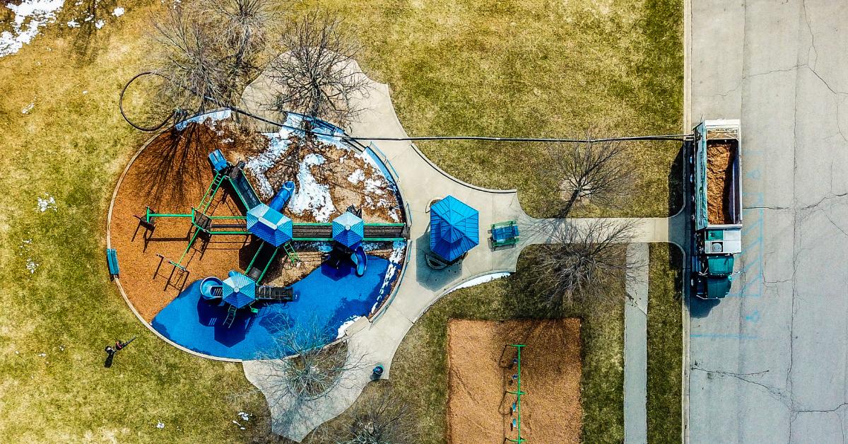 A truck installing EWF playground mulch