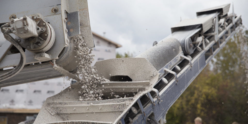 crushed stone on a slinger truck close up