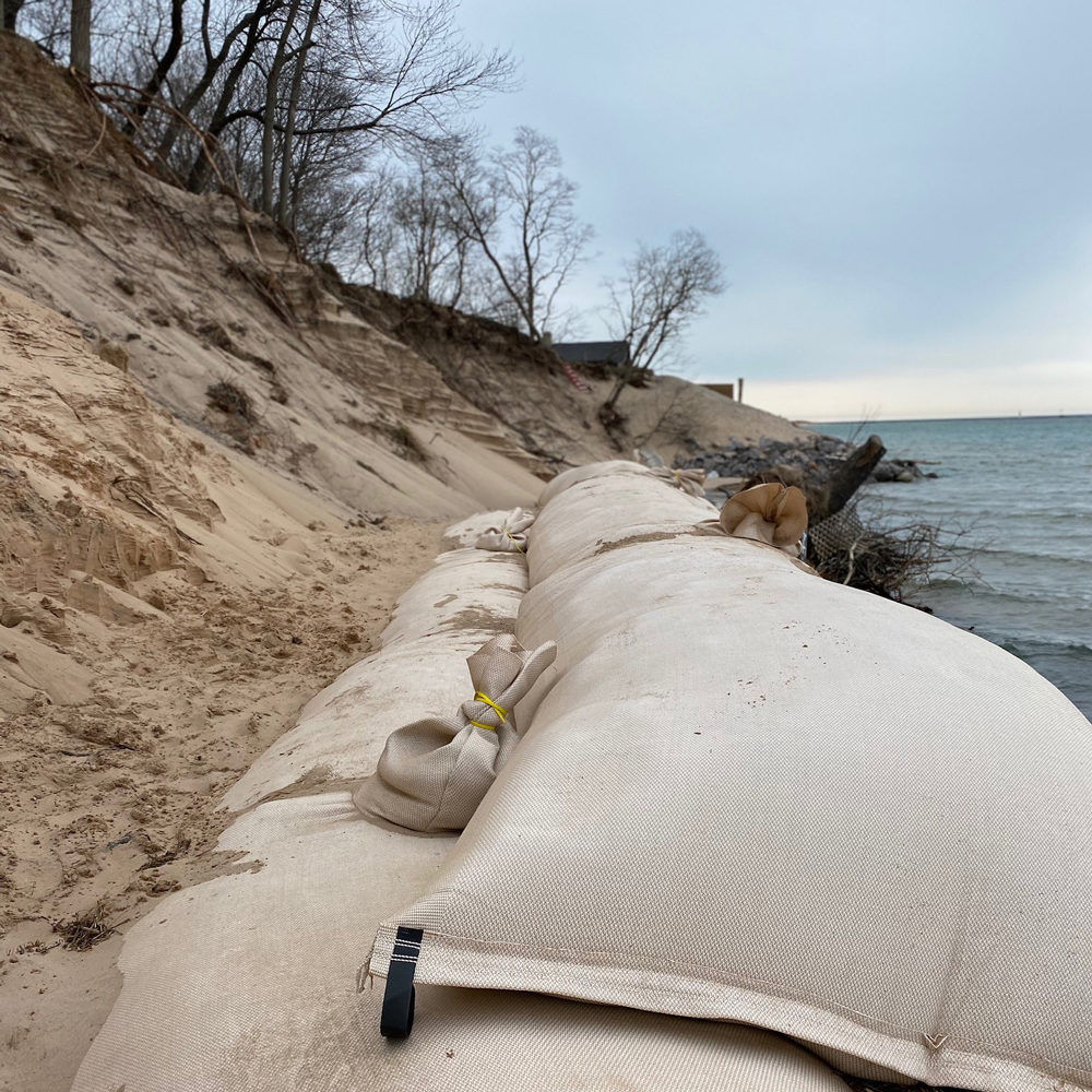 Sand Tubes for Erosion Control along Lakeshore Sand Tubes on Lake Michigan to control erosion